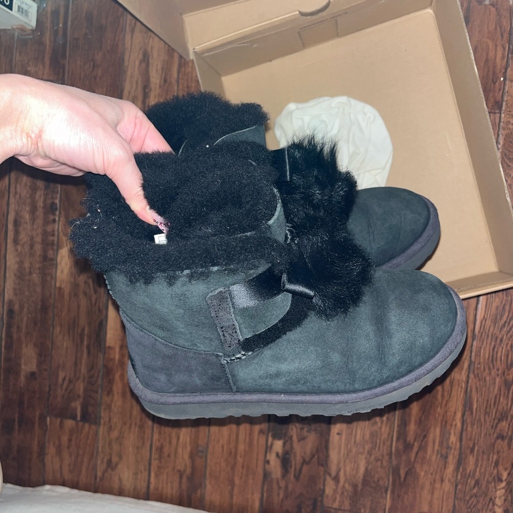 Black pompom UGGs